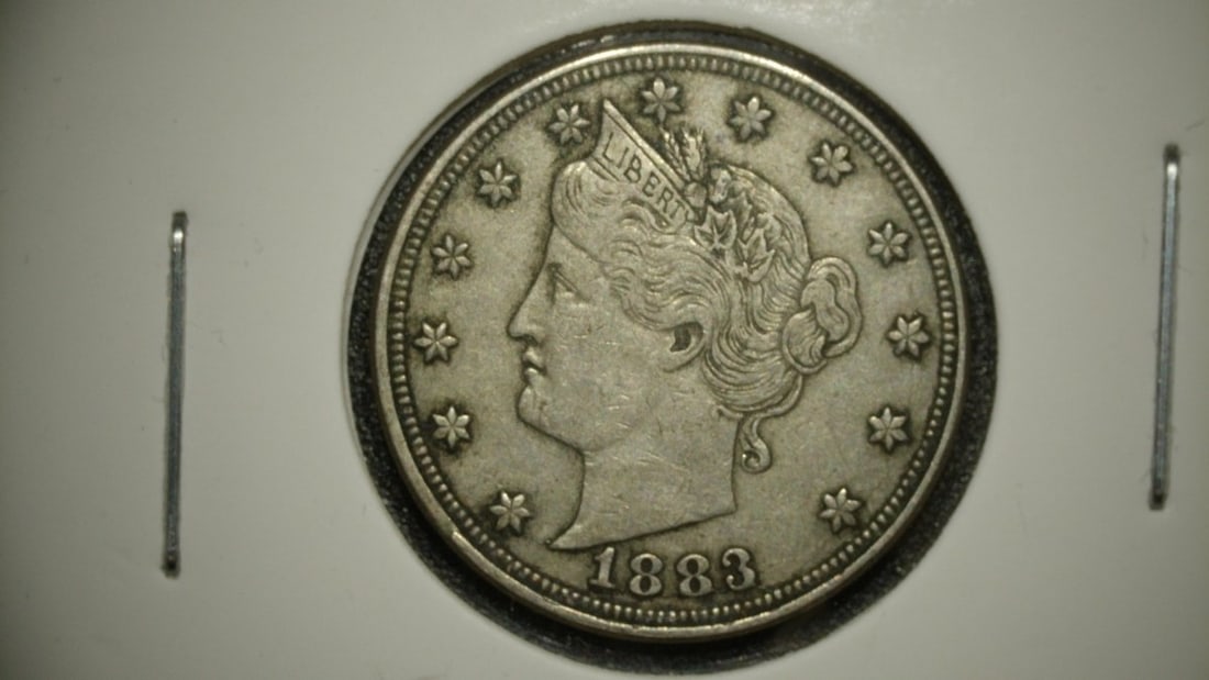 1883 Liberty Head V Nickel No CENTS Very Fine VF Charles E. Barber: **Important** Please read below description on how to avoid high shipping costs. This is an 1883 Liberty Head 'V' Nickel, notable for being the 'No CENTS' variety from the first year of issue. The coi