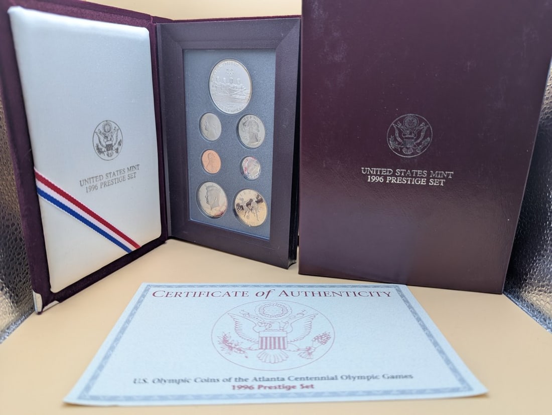1996 United States Mint Olympic Games Prestige Proof Set - Excellent Condition: **Important** Please read below description on how to avoid high shipping costs. Up for auction is a complete 1996 United States Mint Prestige Set, featuring original coins, a velvet display case,