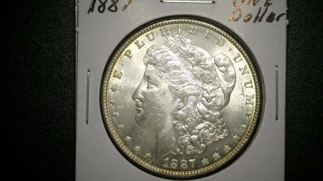 1887 Morgan Silver Dollar Uncirculated Coin by George T. Morgan (1 of 2)