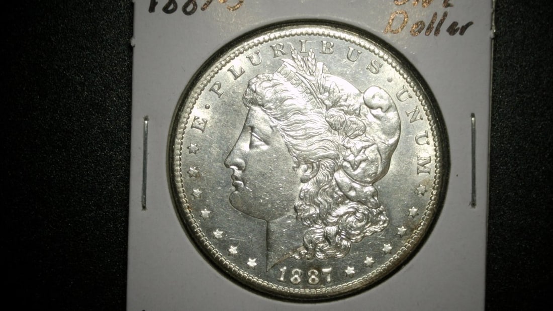 1887-S Morgan Silver Dollar Uncirculated Coin by George T. Morgan (1 of 2)