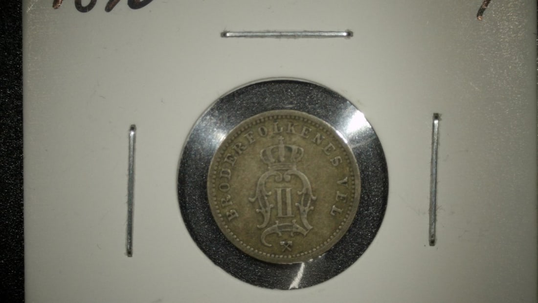 1876 Norway Silver 10 Ore Coin, Extra Fine Grade, Kongsberg Mint, Oscar II: **Important** Please read below description on how to avoid high shipping costs. Presenting a stunning 1876 Norway Silver 10 Ore coin, graded as Extra Fine. This piece exhibits light, even wear that