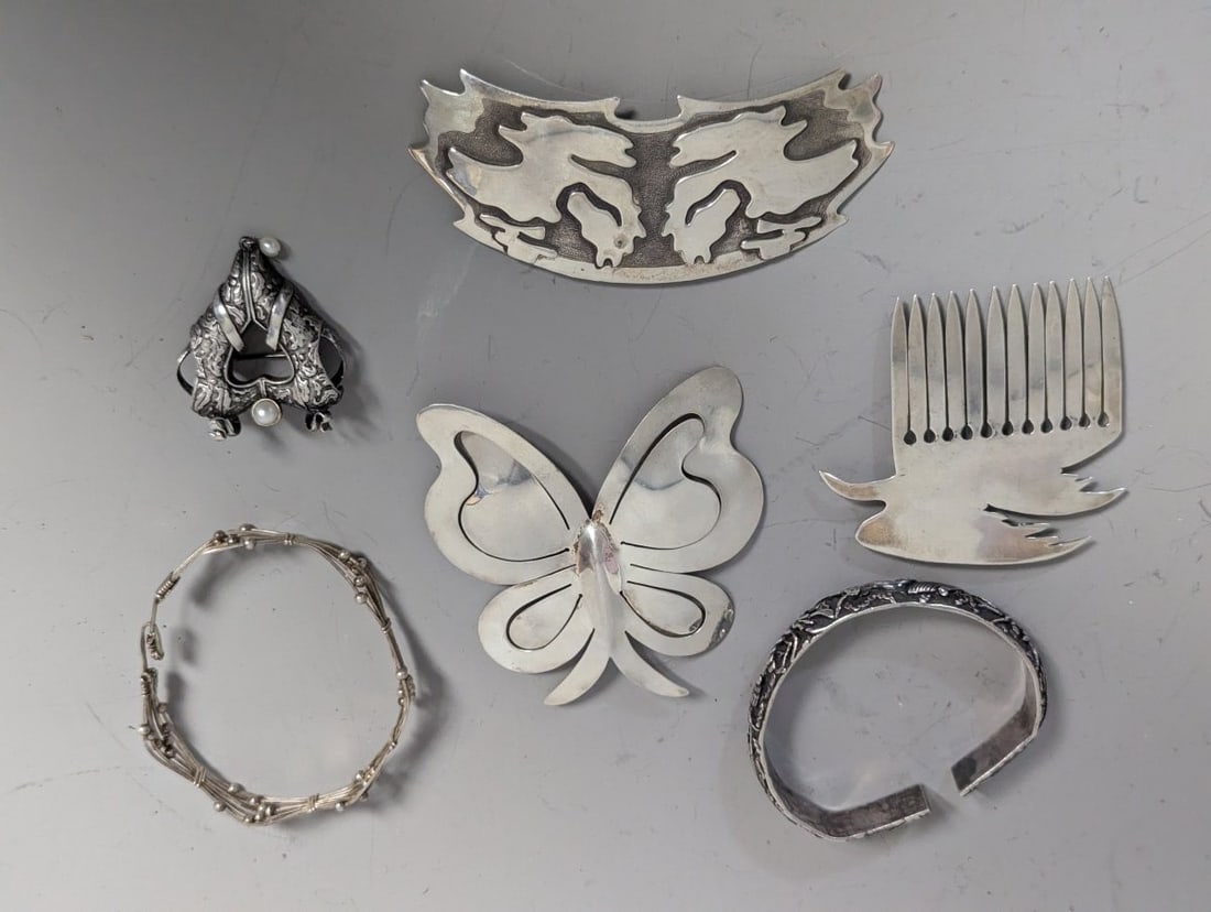 Vintage Georg Jensen Sterling Silver Brooch & Other Antique Jewelry Collection: **Important** Please read below description on how to avoid high shipping costs. This exquisite collection features six vintage and antique sterling silver jewelry items, totaling 183 grams. Highlight