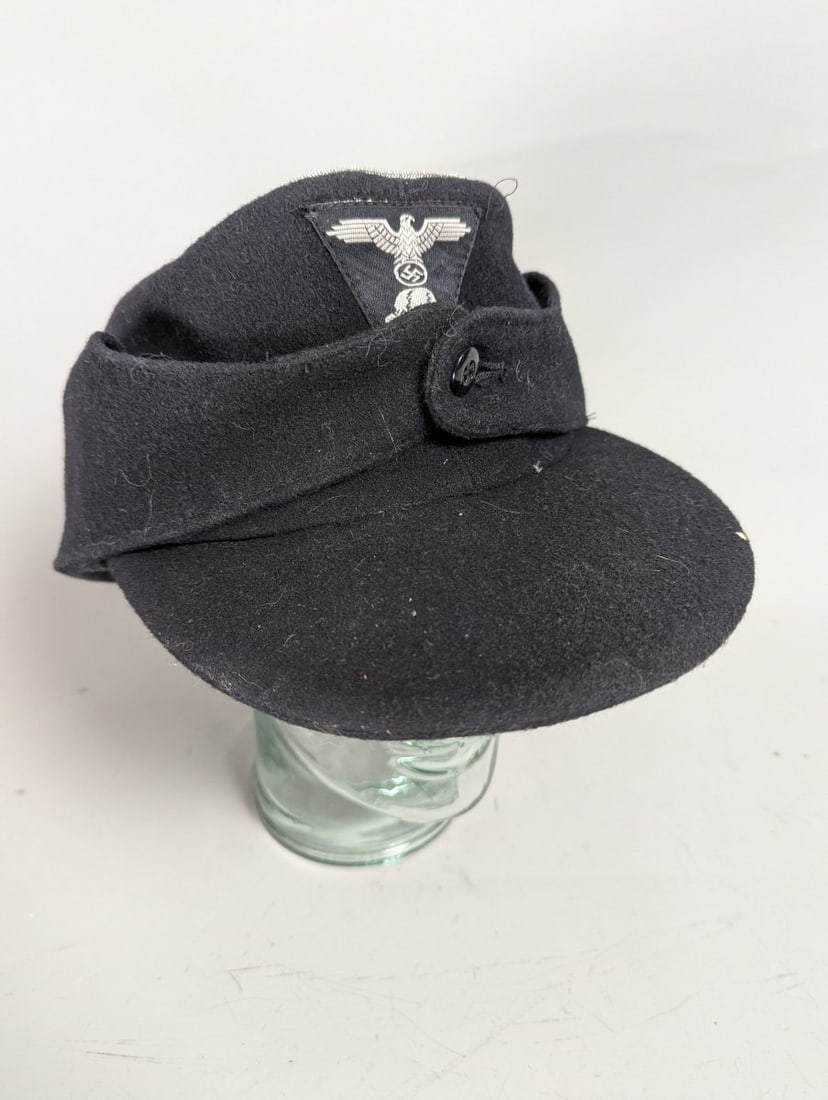 German WWII SS Panzer Officer M43 Field Cap EinheitsfeldmÃ¼tze Rare Militaria Collectible: **Important** Please read below description on how to avoid high shipping costs. Up for auction is a remarkable German WWII SS Panzer Officer's M43 Field Cap (EinheitsfeldmÃ¼tze). This