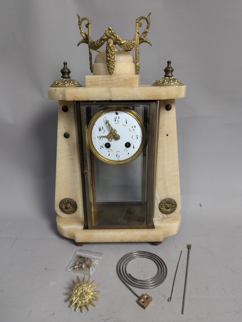 Japy FrÃ¨res Louis XVI Style Onyx Gilt Metal Mantel Clock For Restoration Project: **Important** Please read below description on how to avoid high shipping costs. Presenting a Japy FrÃ¨res Louis XVI Style Onyx & Gilt Metal Mantel Clock, featuring dimensions of 17 x 5 x