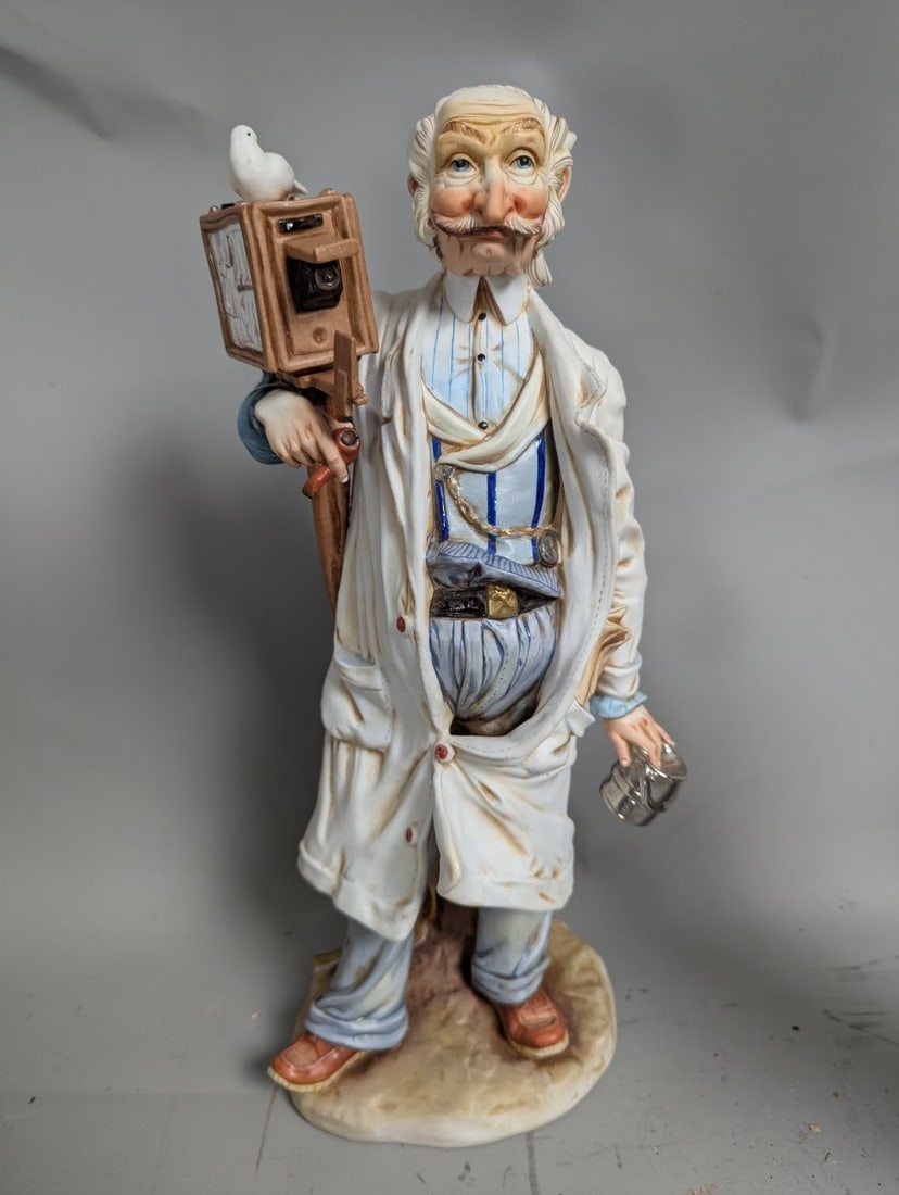 Lopez Moreno The Photographer Vintage Porcelain Figurine Collectible Artisan Piece: **Important** Please read below description on how to avoid high shipping costs. This stunning Lopez Moreno 'The Photographer' porcelain figurine stands at 16 high x 6 1/2 x 5. Crafted by the