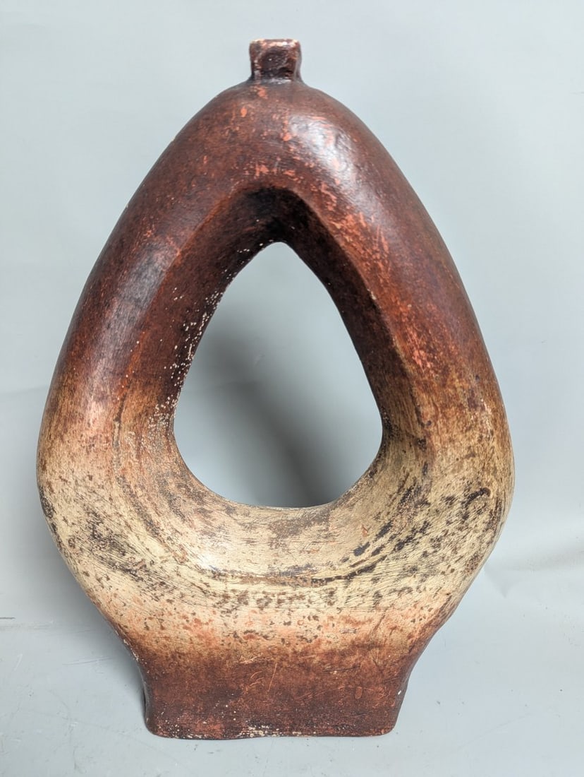 Large Brutalist Style Ceramic Cutout Vase Unique Decorative Piece for Home: **Important** Please read below description on how to avoid high shipping costs. Up for auction is a stunning Large Brutalist Style Ceramic Cutout Vase, measuring 20 high x 14 x 4. This unique piece