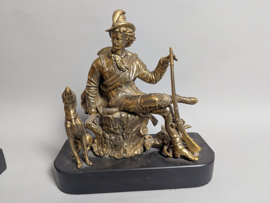 Antique Brass Sculpture of a Hunter with Dogs on Onyx Base Unmarked 19th Century: **Important** Please read below description on how to avoid high shipping costs. This exquisite antique brass sculpture captures a 19th-century hunter at rest, surrounded by his loyal dogs and catch.