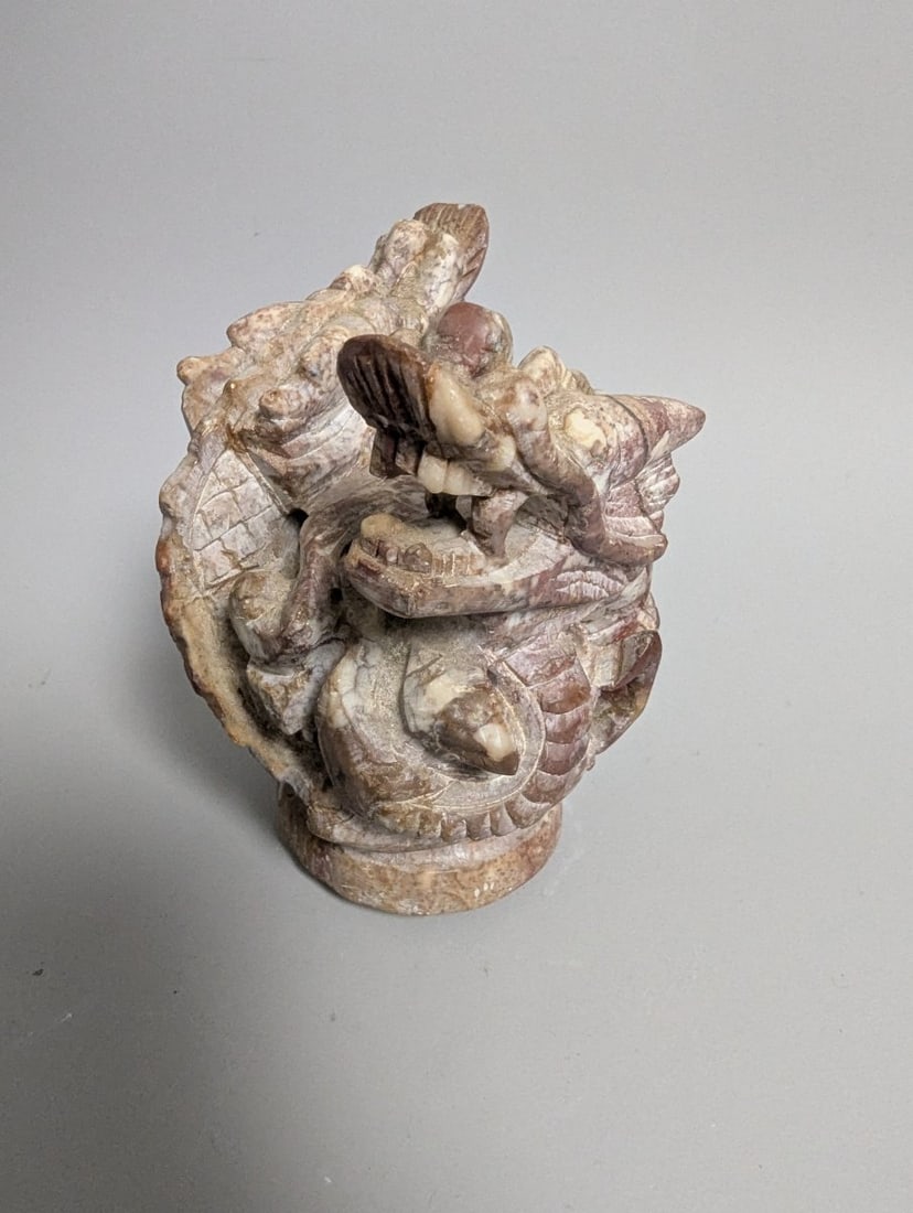 Hand-Carved Soapstone Dragon Finial Censer Decorative Art from China: **Important** Please read below description on how to avoid high shipping costs. Discover this exquisite hand-carved soapstone dragon finial, standing 4 1/2 high x 4 x 4 inches, with its striking mott