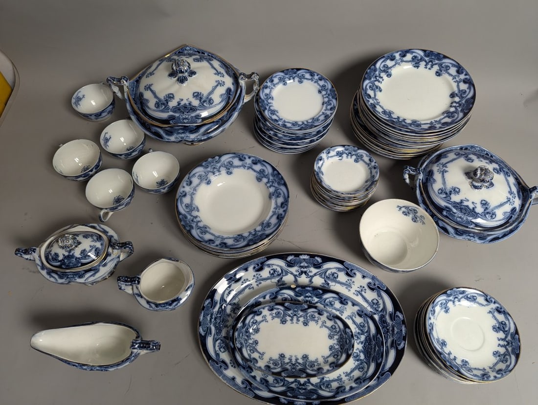 Large Lot of Royal Staffordshire Iris Flow Blue Antique Dinnerware Set: **Important** Please read below description on how to avoid high shipping costs. Discover a stunning large lot of antique Flow Blue dinnerware, featuring the exquisite 'Iris' pattern by Royal Stafford