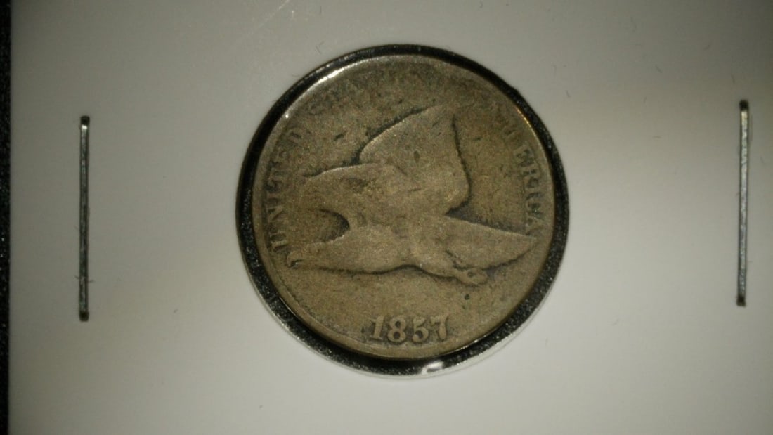1857 Flying Eagle Cent G Good Condition - First Year Issue by James B. Longacre: **Important** Please read below description on how to avoid high shipping costs. This is an 1857 Flying Eagle Cent, the first year of regular issue for this short-lived series. Designed by James B.