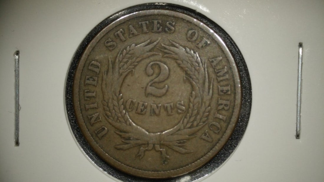 1864 Two Cent Piece Double Die Reverse DDR V.F. Collectible Coin: **Important** Please read below description on how to avoid high shipping costs. This is an 1864 Two Cent piece, a notable variety known as a Double Die Reverse (DDR). The coin is graded as V.F. (Very