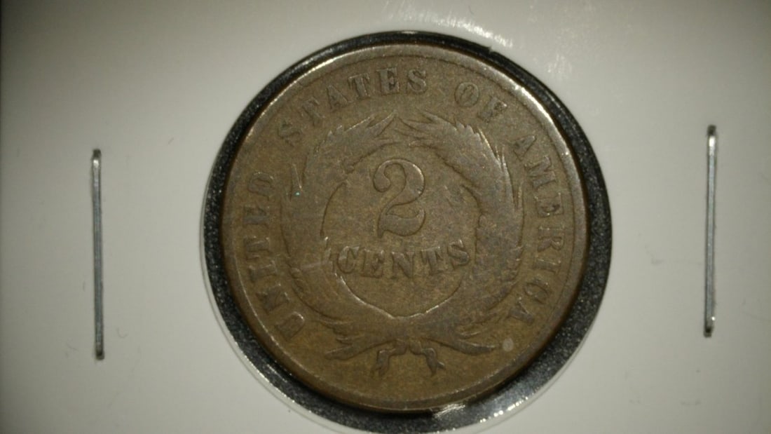 1865 Two Cent Piece AG About Good Coin by James B. Longacre - U.S. Mint: **Important** Please read below description on how to avoid high shipping costs. This is an 1865 Two Cent piece from the United States Mint. Designed by James B. Longacre, this series was the first U.