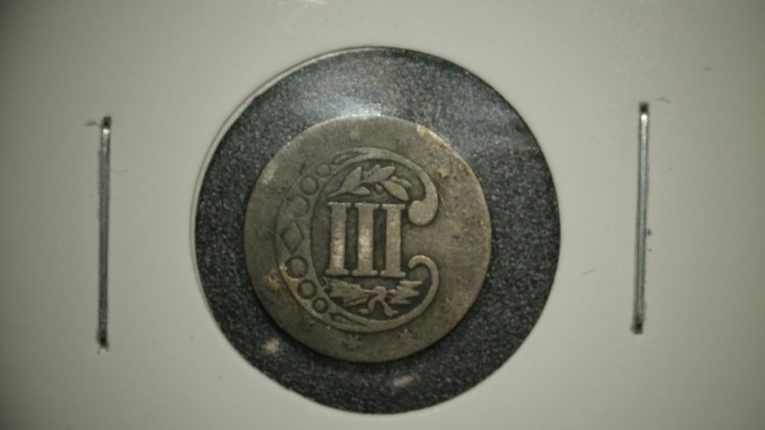 1857 Silver Three-Cent Piece Trime Coin AG by James B. Longacre - Classic U.S. Currency: **Important** Please read below description on how to avoid high shipping costs. This is an 1857 Silver Three-Cent Piece, also known as a 'trime'. The coin exhibits heavy wear and is in About Good (AG