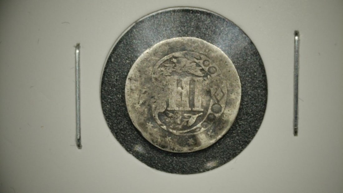1858 Silver Three-Cent Piece Trime G Graded Coin by United States Mint: **Important** Please read below description on how to avoid high shipping costs. This is an 1858 Silver Three-Cent Piece, often referred to as a 'trime.' The obverse features a large six-pointed star 