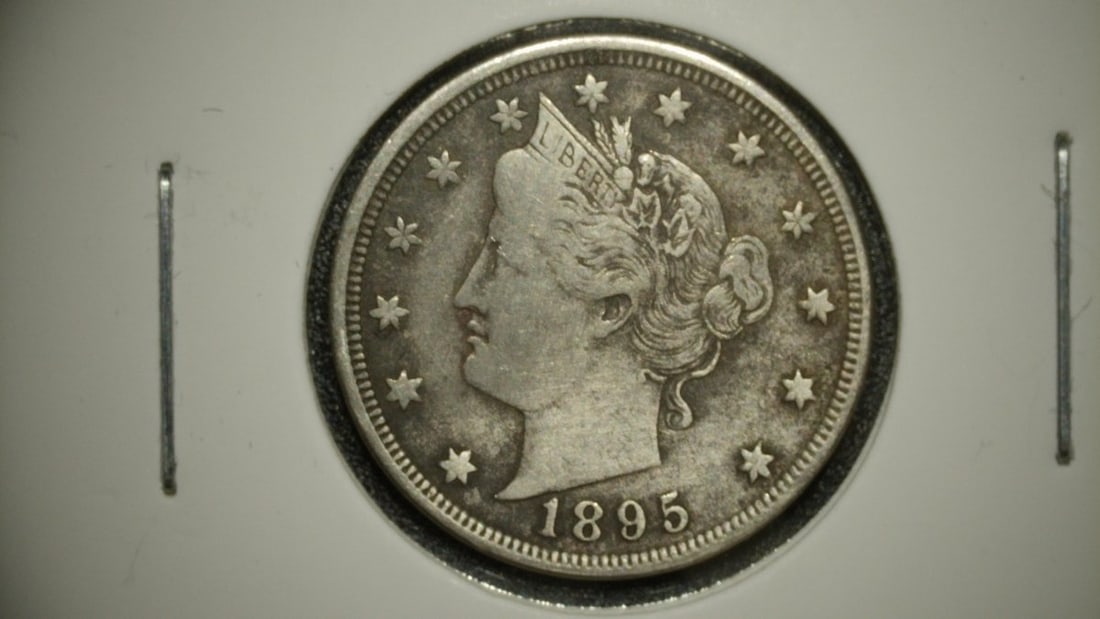 1895 Liberty Head Nickel VF by Charles E. Barber - Key Date Coin: **Important** Please read below description on how to avoid high shipping costs. Discover this stunning 1895 Liberty Head 'V' Nickel, graded as Very Fine (VF). This circulated coin displays visible