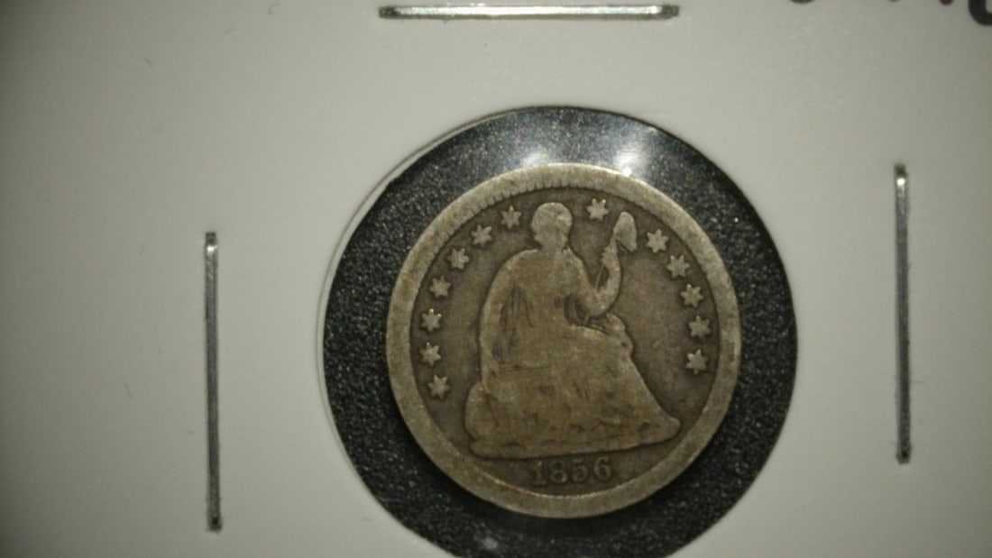 1856 Seated Liberty Half Dime VG by Christian Gobrecht Silver Coin: **Important** Please read below description on how to avoid high shipping costs. This is an 1856 Seated Liberty Half Dime, a five-cent silver coin produced by the United States Mint. The coin is