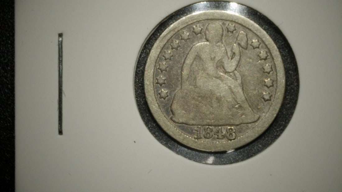 1848 Seated Liberty Dime V.G. Christian Gobrecht US Silver Coin: **Important** Please read below description on how to avoid high shipping costs. This 1848 Seated Liberty Dime showcases the iconic design by Christian Gobrecht, a beloved emblem of American