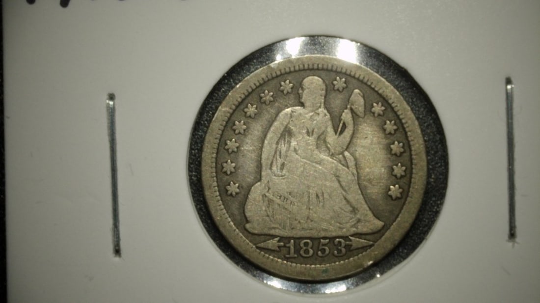1853 Seated Liberty Dime with Arrows VF by Christian Gobrecht - Collectible Silver Coin: **Important** Please read below description on how to avoid high shipping costs. Discover this stunning 1853 Seated Liberty Dime with Arrows, graded Very Fine (VF). This circulated coin showcases mode