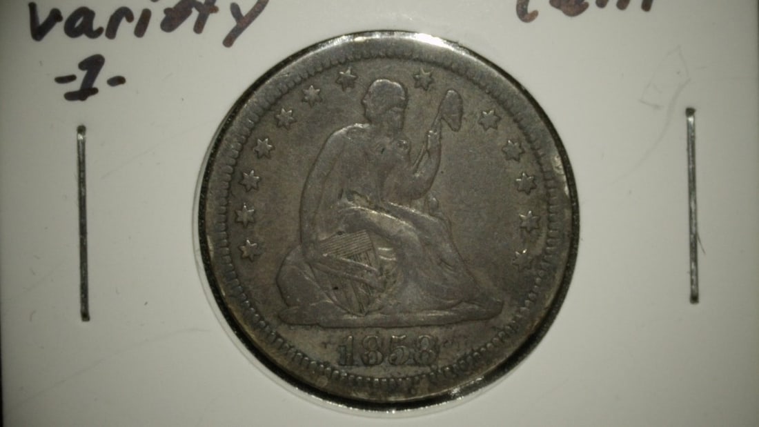 1858 Seated Liberty Quarter Dollar V.G. by Christian Gobrecht - Collector's Coin: **Important** Please read below description on how to avoid high shipping costs. This is an 1858 Seated Liberty Quarter Dollar, graded as Very Good (V.G.). This coin exhibits significant circulation