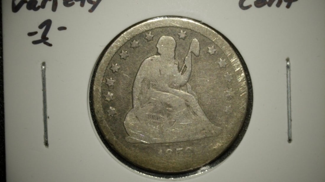 1859-O Seated Liberty Quarter, Variety 1, About Good - Christian Gobrecht Design: **Important** Please read below description on how to avoid high shipping costs. This is an 1859-O Seated Liberty Quarter, designed by Christian Gobrecht. Struck at the New Orleans Mint, this coin is