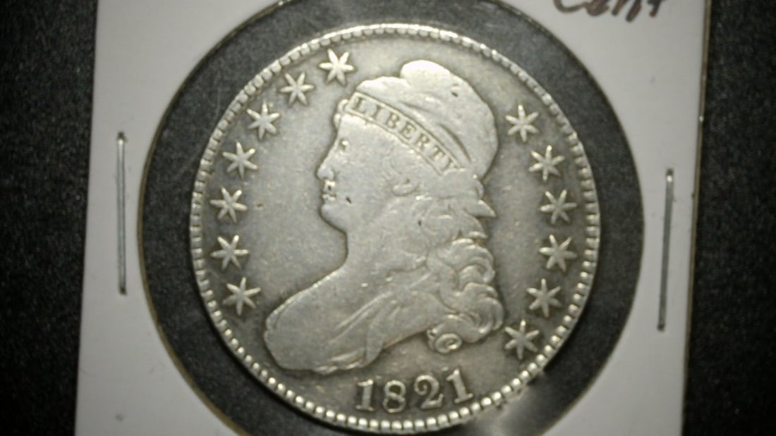 1821 Capped Bust Half Dollar XF John Reich United States Mint Philadelphia: **Important** Please read below description on how to avoid high shipping costs. This exquisite 1821 Capped Bust Half Dollar, graded Extra Fine, is a must-have for any serious numismatist. The coin