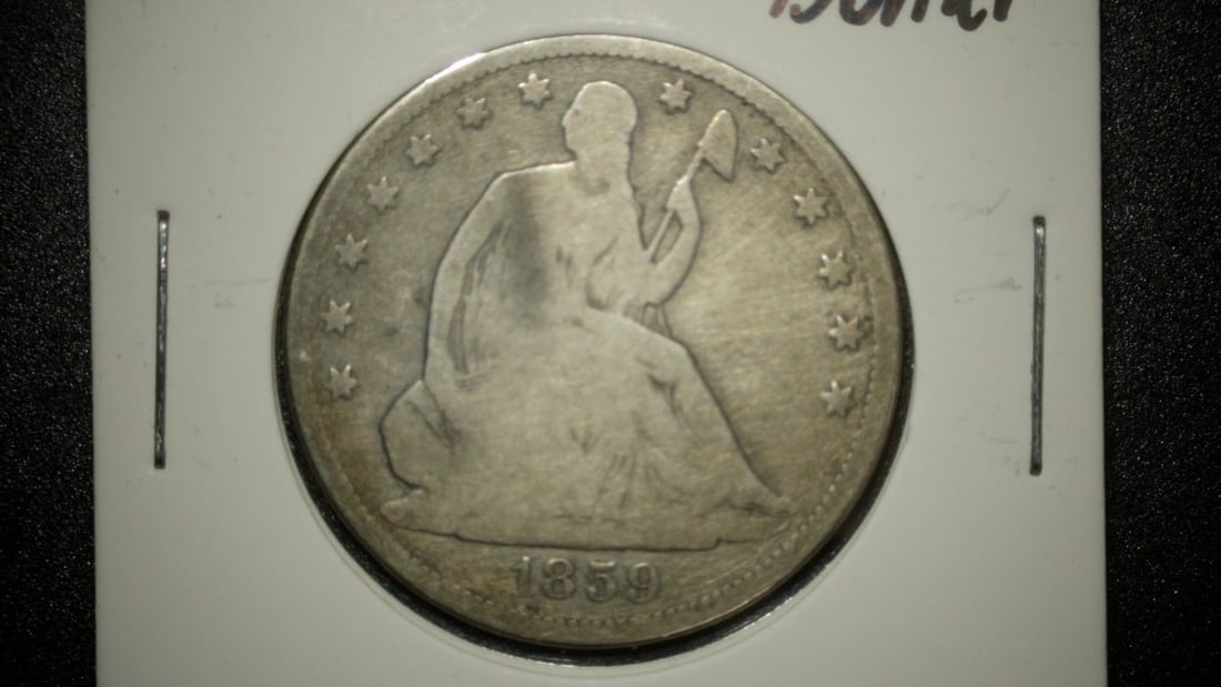 1859-S Seated Liberty Half Dollar Coin by Christian Gobrecht - Grade Very Good (VG): **Important** Please read below description on how to avoid high shipping costs. Discover this remarkable 1859-S Seated Liberty Half Dollar, a striking collectible from the San Francisco Mint,