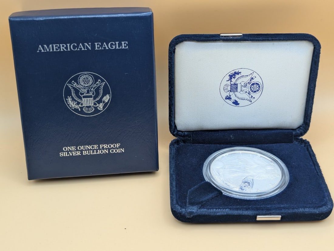 2006-W American Eagle One Ounce Proof Silver Dollar - Mint Condition - Adolph A. Weinman: **Important** Please read below description on how to avoid high shipping costs. Up for auction is a stunning 2006-W American Eagle One Ounce Proof Silver Dollar. This coin is a proof specimen that bo