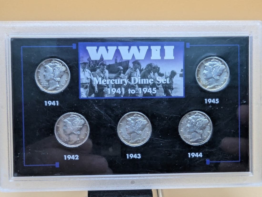 WWII Mercury Dime Set 1941-1945 by Adolph A. Weinman - Good Grade: **Important** Please read below description on how to avoid high shipping costs. This unique commemorative set features five genuine United States Mercury Dimes, minted between 1941 and 1945,