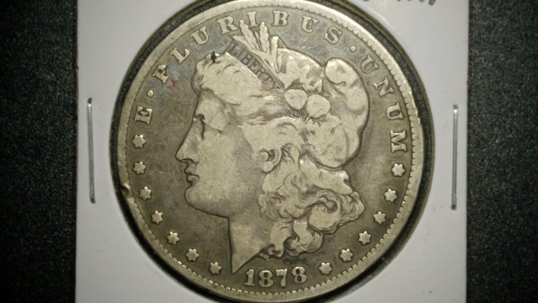 1878-CC Morgan Silver Dollar Fine by George T. Morgan - Carson City Mint Coin: **Important** Please read below description on how to avoid high shipping costs. This auction features a beautiful 1878-CC Morgan Silver Dollar, graded Fine. This coin demonstrates moderate