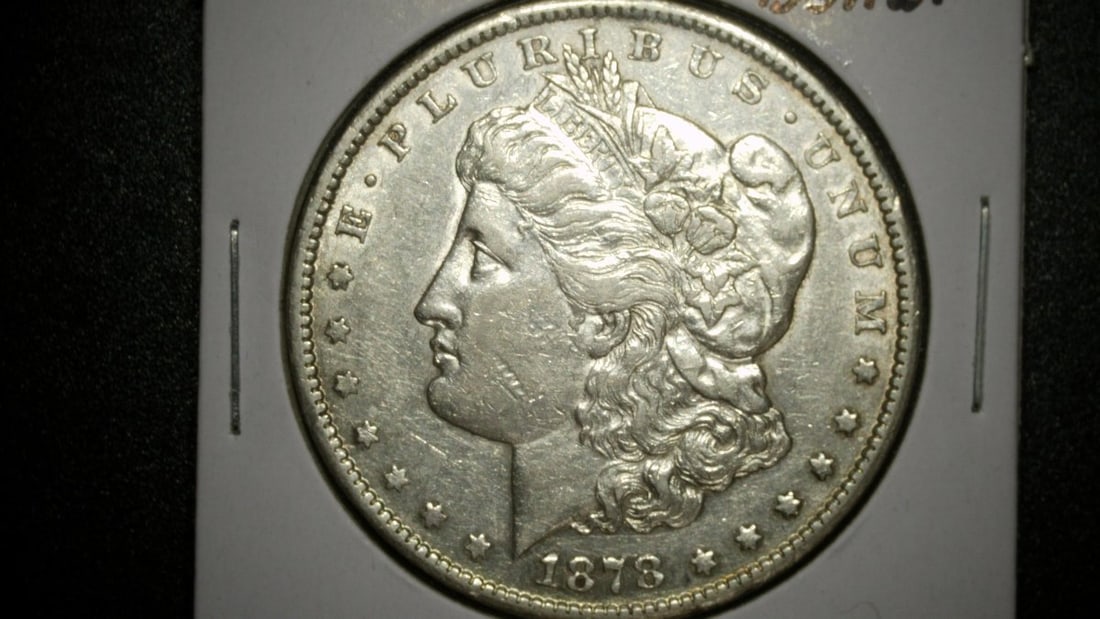 1878-CC Morgan Silver Dollar AU Grade, Key Date Coin - Stunning Collectible: **Important** Please read below description on how to avoid high shipping costs. This 1878-CC Morgan Silver Dollar is a highly sought-after key date for numismatic enthusiasts. Graded Almost