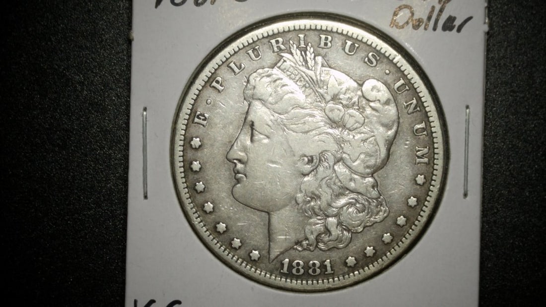 1881-S Morgan Silver Dollar Coin VG Designed by George T. Morgan: **Important** Please read below description on how to avoid high shipping costs. Discover this 1881-S Morgan Silver Dollar, professionally graded in Very Good (VG) condition. Minted at the San Francis
