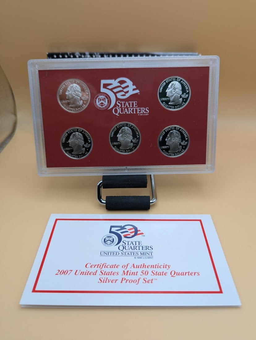 2007 United States Mint 50 State Quarters Silver Proof Set - Excellent Condition: **Important** Please read below description on how to avoid high shipping costs. This is the official 2007 United States Mint 50 State Quarters Silver Proof Set, featuring five coins representing Mont