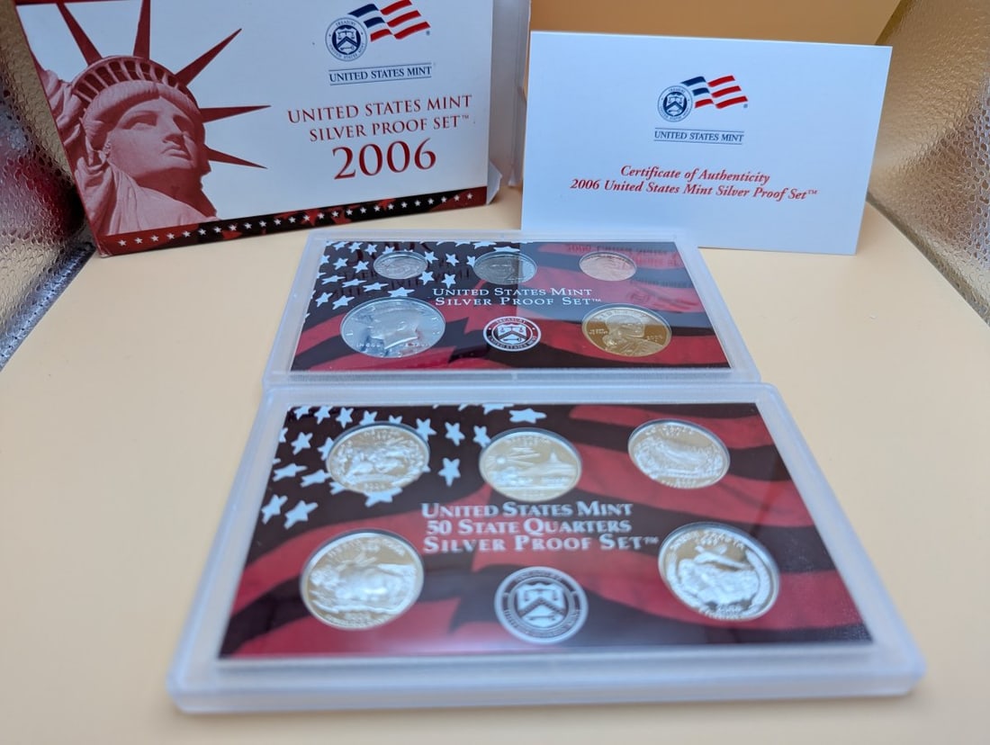 2006-S United States Mint Silver Proof Set with Box & Certificate of Authenticity: **Important** Please read below description on how to avoid high shipping costs. Discover this remarkable 2006-S United States Mint Silver Proof Set, a must-have for any coin collector! This complete 