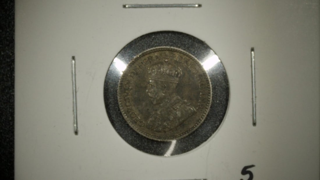 1918 Canada Silver 5 Cents Coin George V Extra Fine Sterling Silver Fish Scale: **Important** Please read below description on how to avoid high shipping costs. This is a 1918 Canadian 5 Cent coin, often referred to as a 'fish scale' due to its small size and silver composition.