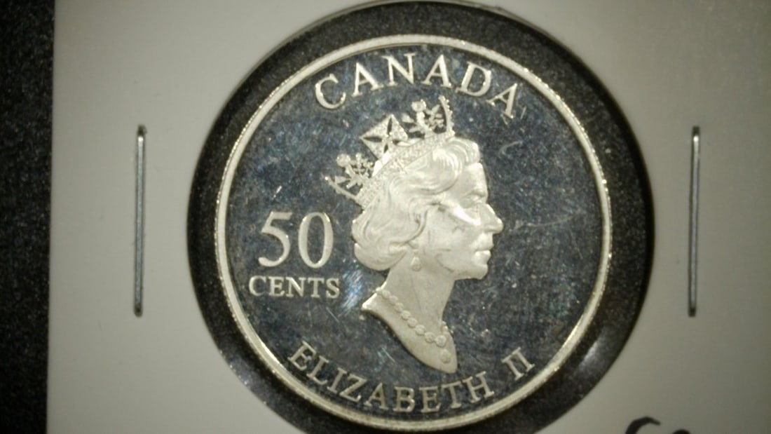 2002 Canada 50 Cents Manitoba Sterling Silver Proof Coin by Dora de PÃ©dery-Hunt: **Important** Please read below description on how to avoid high shipping costs. Up for auction is a stunning 2002 Canada 50 Cents Manitoba Sterling Silver Proof Coin. This exquisite specimen features