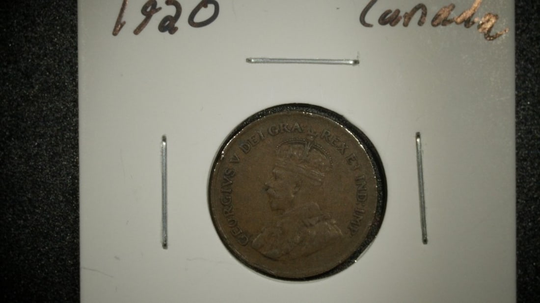 1920 Canada King George V One Cent Coin Small Cent Very Fine VF: **Important** Please read below description on how to avoid high shipping costs. Up for auction is a stunning 1920 Canada King George V One Cent Coin, known as the Small Cent, graded Very Fine (VF).