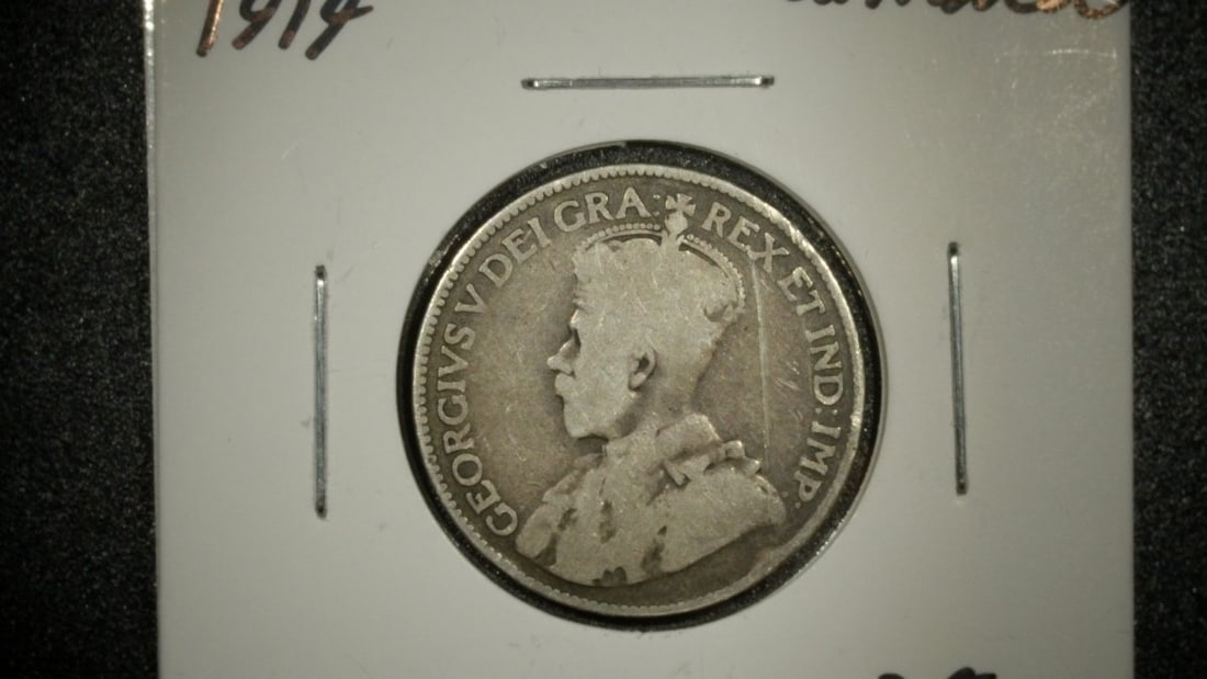 1913 & 1919 Canada 25 Cents Silver Coins George V About Good & Good: **Important** Please read below description on how to avoid high shipping costs. This is a lot of two Canadian silver quarters from the reign of King George V. The lot includes a 1913 25 Cents graded 