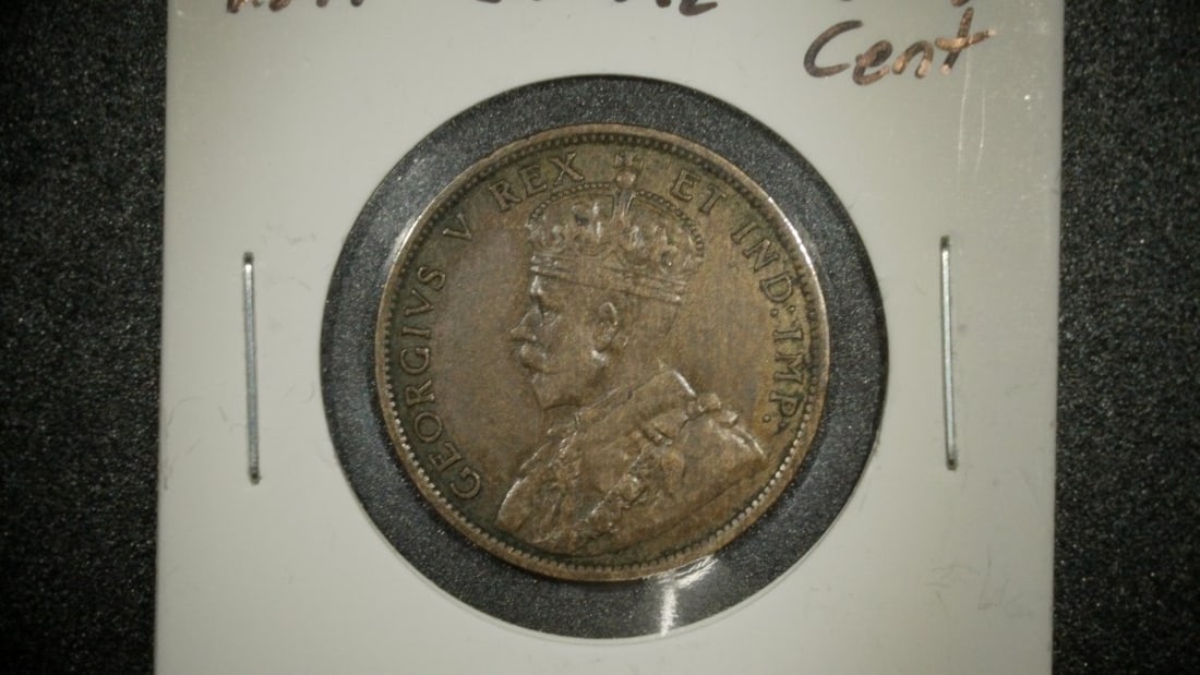 Lot of 2 Canadian King George V One Cent Coins 1911 Godless and 1917 E.F. Grade: **Important** Please read below description on how to avoid high shipping costs. This is a lot of two Canadian Large Cents from the reign of King George V, both graded as Extremely Fine (E.F.). The