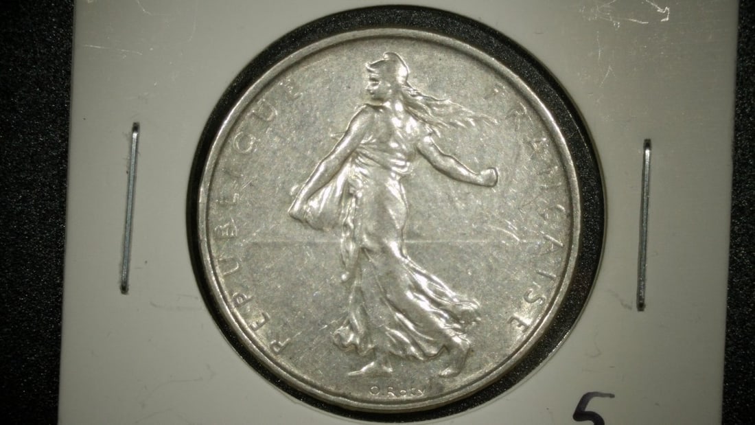 1963 France 5 Francs Semeuse Silver Coin Uncirculated by Louis-Oscar Roty: **Important** Please read below description on how to avoid high shipping costs. This stunning 1963 French 5 Francs silver coin features the iconic 'La Semeuse' (The Sower) design by the renowned Fren