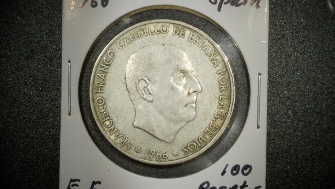 1966 Spain 100 Pesetas Silver Coin Francisco Franco Extra Fine Collectible: **Important** Please read below description on how to avoid high shipping costs. This stunning 1966 Spain 100 Pesetas silver coin features the portrait of Francisco Franco, minted by the Royal Mint of