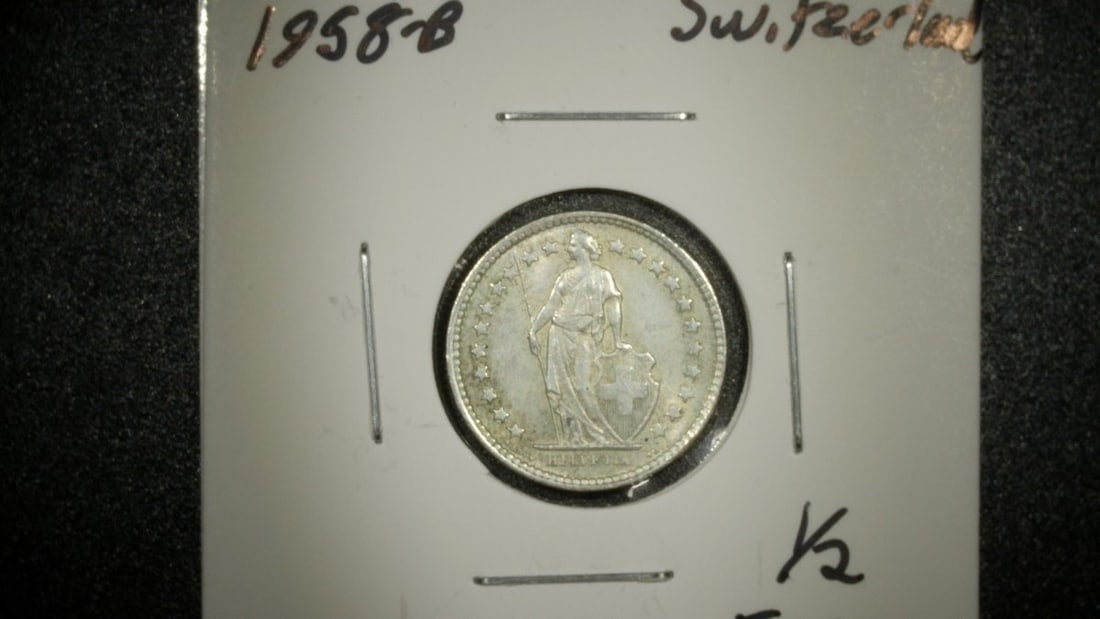 Lot of 3 Swiss 1/2 Franc Coins 1958-B AU, 1948-B VF, 1950-B VG Antoine Bovy Engraver: **Important** Please read below description on how to avoid high shipping costs. This captivating collection features three Swiss 1/2 Franc coins, showcasing the craftsmanship of the noted engraver
