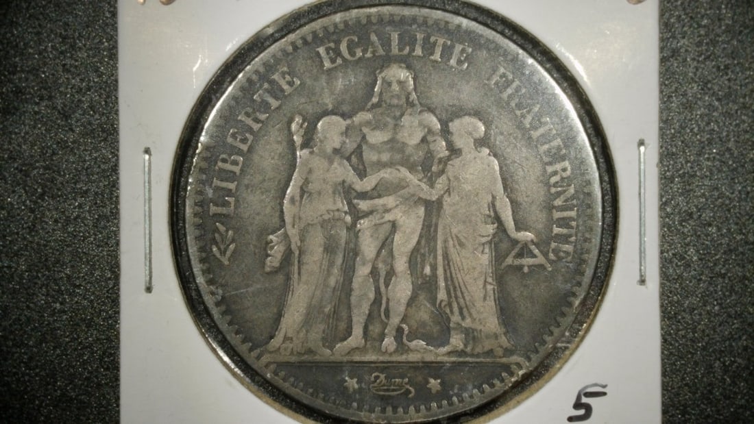 1874-A France 5 Francs Silver Coin Hercules Type by Augustin DuprÃ© - VF Grade: **Important** Please read below description on how to avoid high shipping costs. This beautiful 1874-A France 5 Francs Silver Coin features the iconic Hercules type, designed by the renowned artist