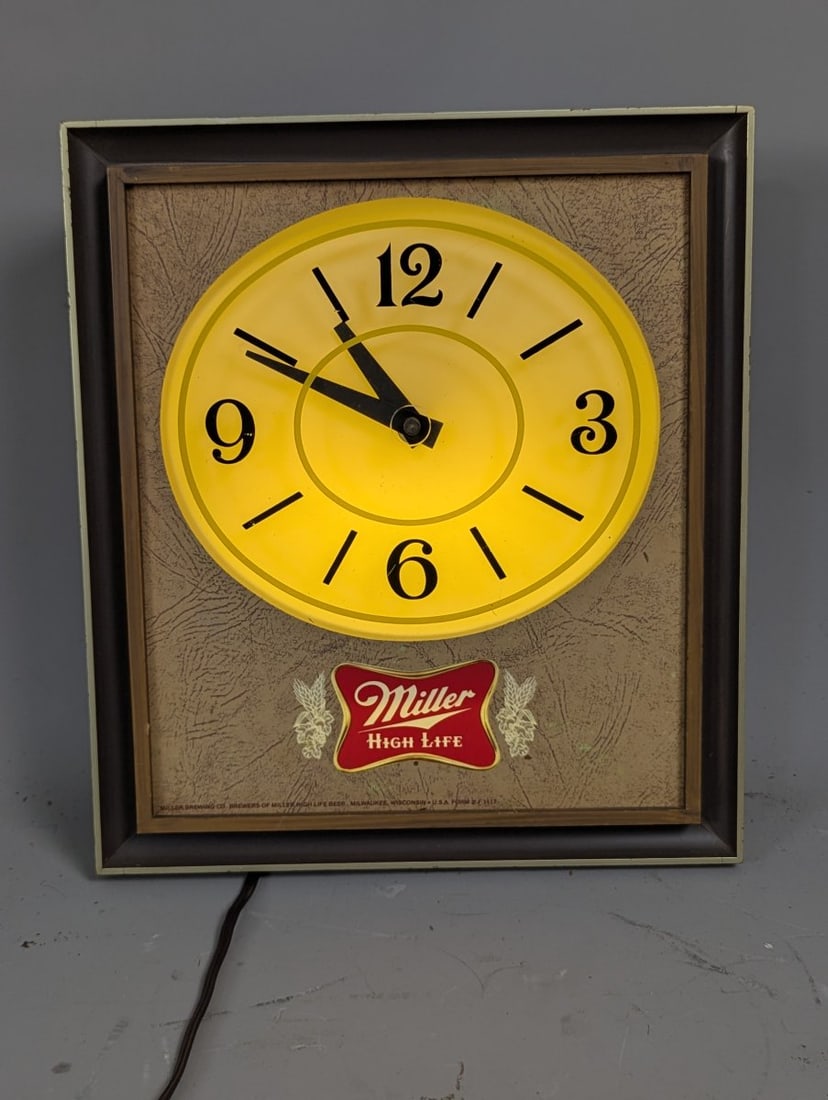 Vintage Miller High Life Lighted Advertising Clock Breweriana Bar Decor 1970s: **Important** Please read below description on how to avoid high shipping costs. Introducing a fantastic piece of breweriana, the Vintage Miller High Life Lighted Advertising Clock, measuring 12 high 