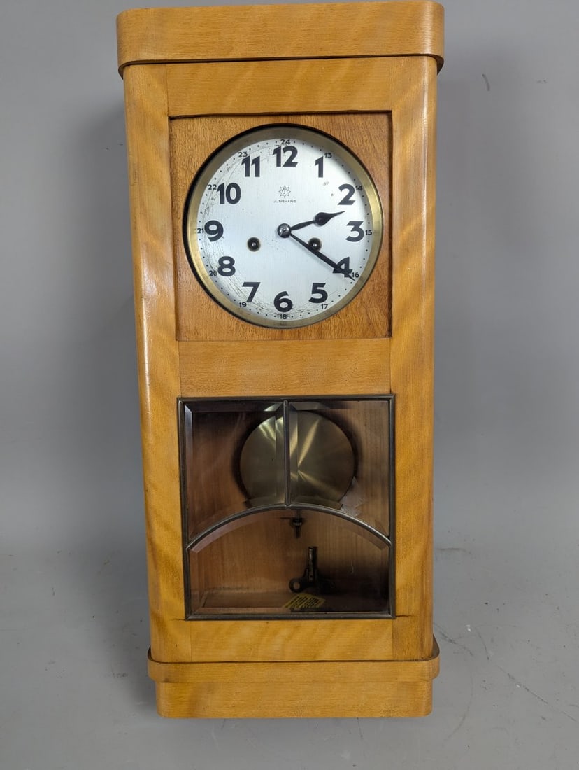 Junghans Art Deco Wall Clock Vintage Style with Pendulum and Key Working Condition: **Important** Please read below description on how to avoid high shipping costs. Up for auction is a stunning Junghans Art Deco style wall clock, measuring 22 high x 11 x 6. This exquisite piece