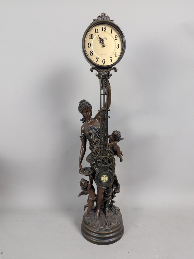 Design Toscano Flora Figural Pendulum Clock Neoclassical Art Nouveau Home Decor: **Important** Please read below description on how to avoid high shipping costs. Elevate your home decor with this exquisite Design Toscano 'Flora' Figural Pendulum Clock, measuring 35 high x 8