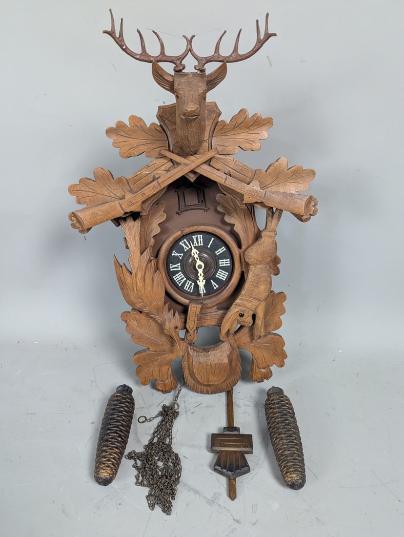 Vintage Regula Schmeckenbecher 8-Day Hunter Cuckoo Clock Collectible Black Forest Design: **Important** Please read below description on how to avoid high shipping costs. Up for auction is a vintage Regula Schmeckenbecher 8-Day Hunter Cuckoo Clock, measuring 20 x 14 x 11. Not tested. This 