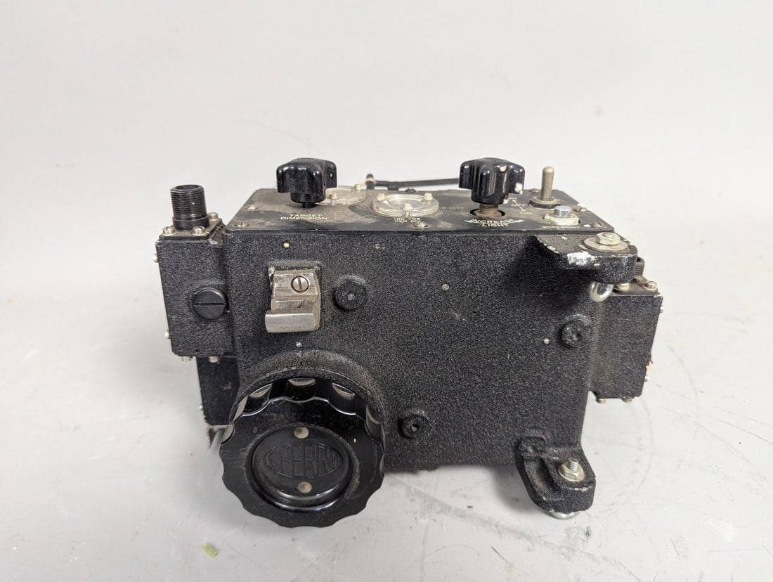 Sperry Gyroscope Co. WW2 Type K-9 Sighting Head Authentic Military Artifact: **Important** Please read below description on how to avoid high shipping costs. Up for auction is a remarkable Sperry Gyroscope Co. Type K-9 Sighting Head, measuring 8 x 10 x 8 inches. This iconic