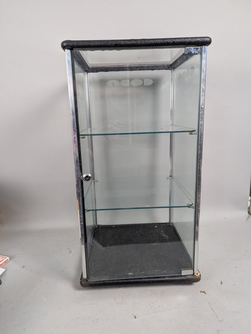 Vintage Coda USA Chrome and Glass Display Cabinet Etched Logo 70s 80s Design: **Important** Please read below description on how to avoid high shipping costs. Discover this vintage Coda USA chrome and glass display cabinet, measuring 31 1/2 high x 17 x 17. This piece showcases