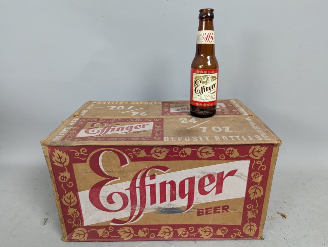 Vintage Effinger Beer Cardboard Case with 24 Little Effy Amber Glass Bottles Collectible Set: **Important** Please read below description on how to avoid high shipping costs. Discover this unique vintage collectible set featuring a cardboard beer case designed to hold 24 amber glass bottles.