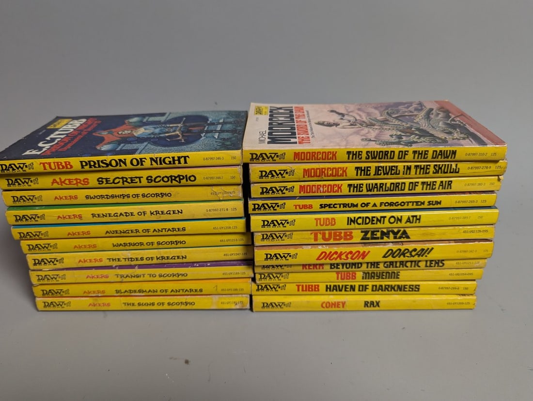 Vintage Sci-Fi Fantasy Paperback Book Collection from DAW Books 1970s E.C. Tubb Moorcock: **Important** Please read below description on how to avoid high shipping costs. Explore this captivating collection of 21 vintage science fiction and fantasy mass-market paperback books published by 